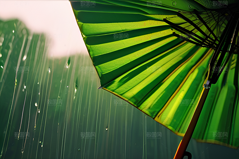 绿色背景下的水滴与雨伞