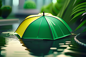 绿色背景下的水滴与黄色雨伞