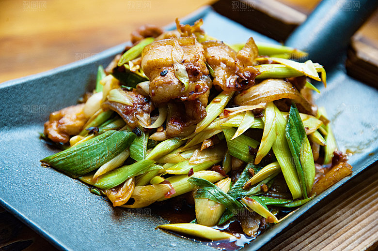 特色五花肉炒葱摄影