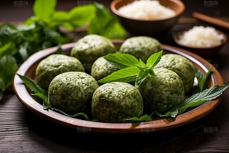 艾草青团糯叽叽美味摄影图