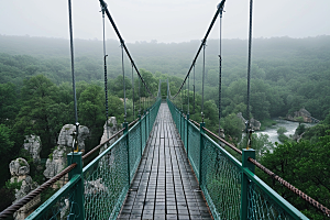 吊桥美景山谷摄影图