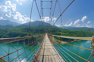 吊桥山谷河流摄影图