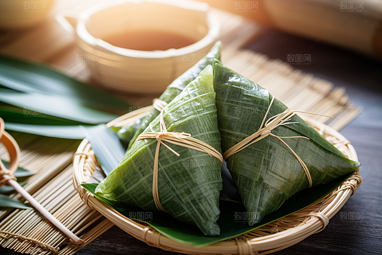 粽子粽叶包粽子摄影图
