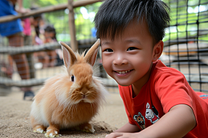 儿童和兔子爱心宠物摄影图