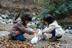 儿童和兔子孩子高清摄影图