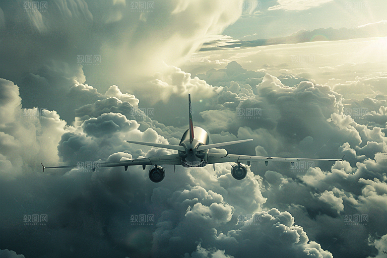飞机飞翔云层之上高空摄影图