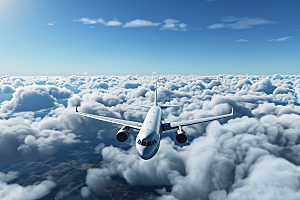 飞机飞翔客机云层之上摄影图