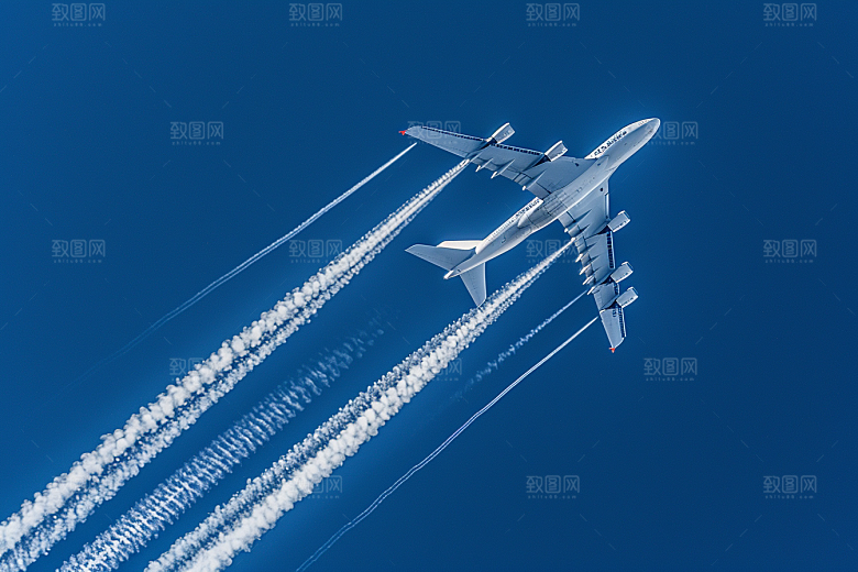 飞机飞翔蓝天高空摄影图