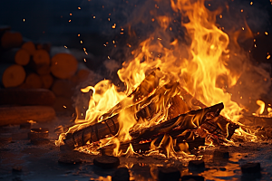 露营篝火取暖山林摄影图
