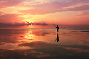 海边赶海海滩落日摄影图