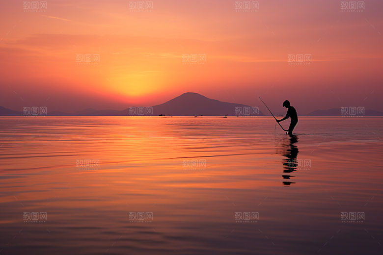 海边赶海礁石落日摄影图