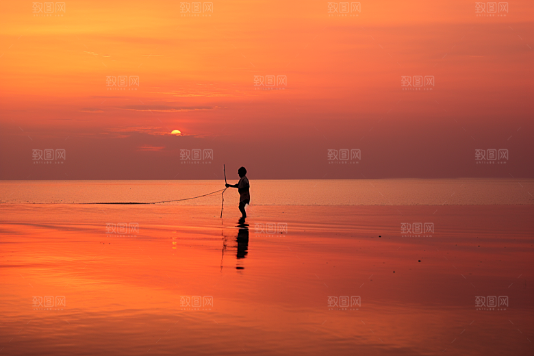 海边赶海夕阳清晨摄影图