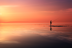 海边赶海落日夕阳摄影图