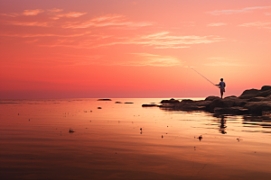 海边赶海渔获黎明摄影图