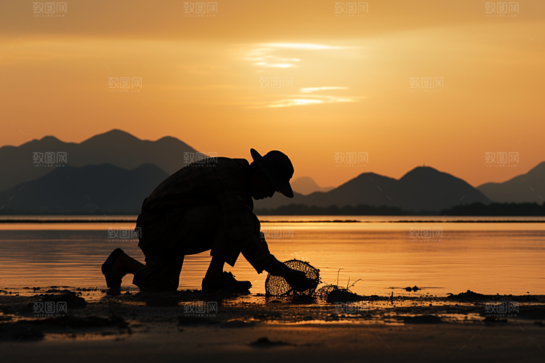 海边赶海捕捞礁石摄影图