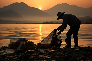 海边赶海夕阳海货摄影图