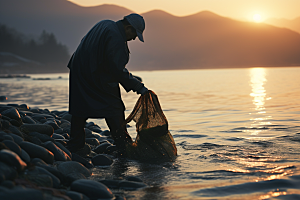 海边赶海余晖滩涂摄影图