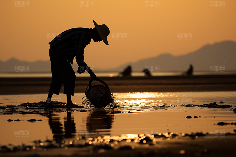 海边赶海落日夕阳摄影图