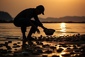 海边赶海黎明高清摄影图