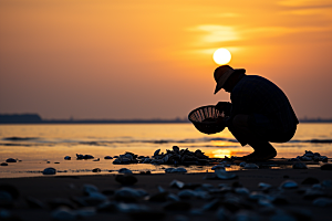 海边赶海黎明礁石摄影图