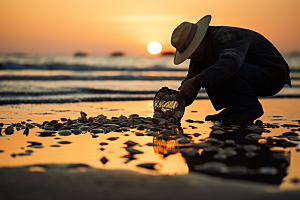 海边赶海高清夕阳摄影图