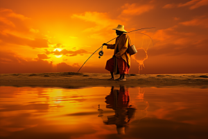 海边赶海海货夕阳摄影图