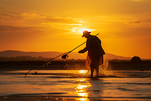 海边赶海潮汐夕阳摄影图