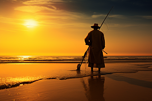 海边赶海夕阳落日摄影图