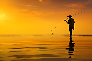 海边赶海滩涂夕阳摄影图