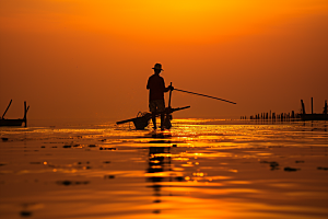 海边赶海余晖滩涂摄影图