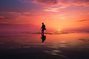 海边赶海余晖黎明摄影图