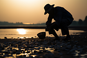 海边赶海礁石滩涂摄影图