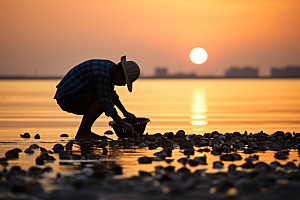 海边赶海清晨礁石摄影图