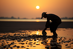 海边赶海礁石海滩摄影图