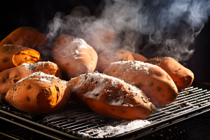 烤红薯香甜温暖摄影图