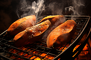 烤红薯美食温暖摄影图