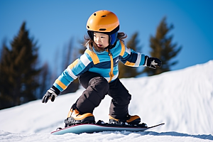 儿童滑雪锻炼冬天摄影图