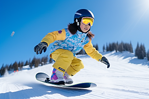 儿童滑雪极限运动小运动员摄影图