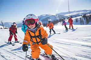 儿童滑雪锻炼冬季摄影图