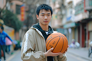 打篮球的人扣篮肖像摄影图