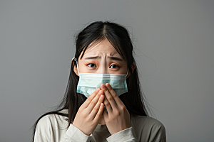 春季流感戴口罩预防传染高清摄影图