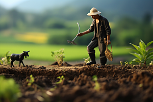 微距小人农民高清农业摄影图
