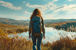 女生旅行背影探险人物摄影图