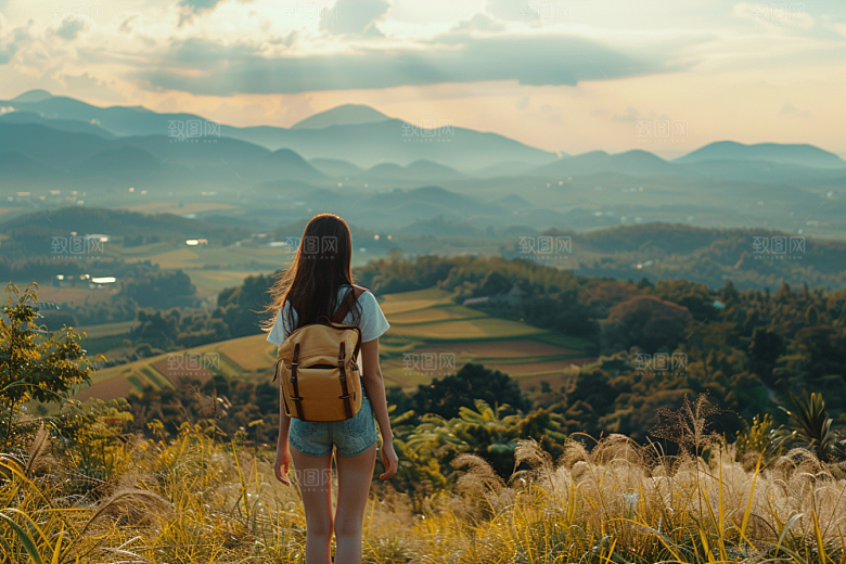 女生旅行背影辽阔户外摄影图