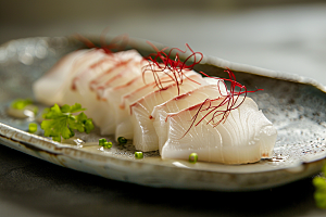 日料生鱼片美食鱼肉摄影图