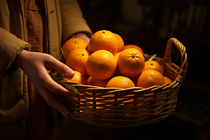 橙子采摘秋季美食脐橙摄影图