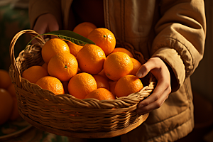 橙子采摘富含维C新鲜摄影图