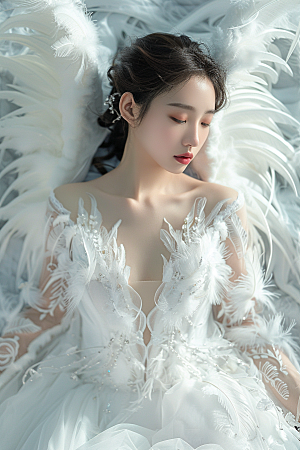 天使女神羽毛翅膀写真摄影图