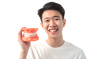 牙科广告人物人物肖像假牙模型摄影图