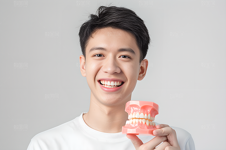 牙科广告人物高清假牙模型摄影图
